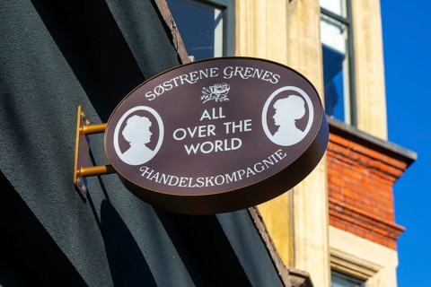 Sign for Søstrene Grene, Danish retail chainstore shop store, in Exeter city centre, Devon,