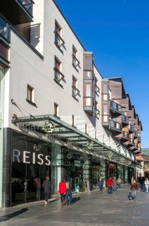 Shoppers walking past Reiss shop store in city centre, Princesshay, Exeter, Devon, England, UK