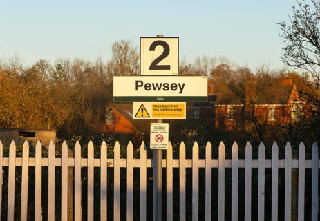 Platform 2 sign in winter morning sunshine, Pewsey railway station, Wiltshire, England, UK