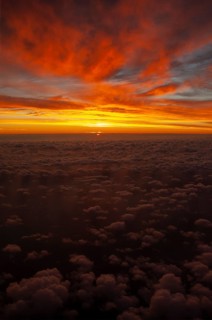 View from airplane window at sunrise