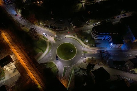 Illuminated roundabout at night with surrounding roads, Nagold, Calw district, Germany