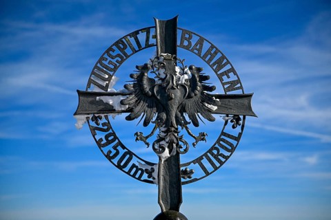 Cross at the mountain station of the Zugspitz cable car, Austrian side, municipality of Ehrwald,