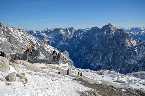 Tourists on a viewing platform on Zugspitzplatt, Grainau municipality, Garmisch-Partenkirchen