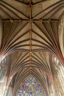 Looking up at vaulted ribbed ceiling inside Exeter cathedral church, Exeter, Devon, England, UK