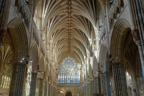 View to west window, vaulted ribbed ceiling inside Exeter cathedral church, Exeter, Devon, England,