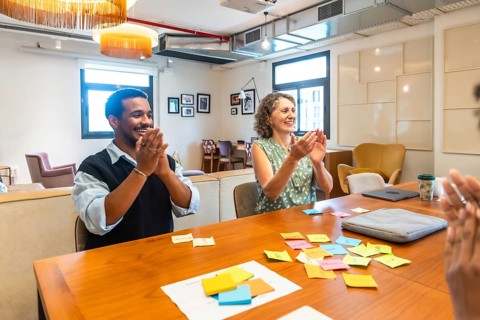 Diverse colleagues participating in a successful meeting, collaborating and brainstorming ideas