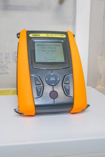 PVcheck PRO electronic measuring device device with orange elements on the surface