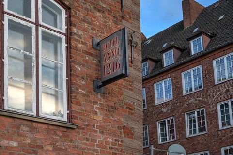 Nose sign from Hotel Anno 1216, historic brick building from the 13th century, Hanseatic City of