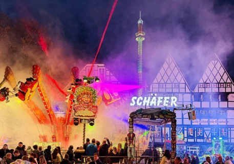 Colourful evening rides in front of half-timbered houses at the All Saints Fair, Altstadt, Soest,