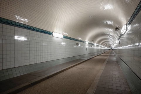 Interior view, pedestrians crossing tunnel, tube, historic old Elbe Tunnel, Free and Hanseatic City
