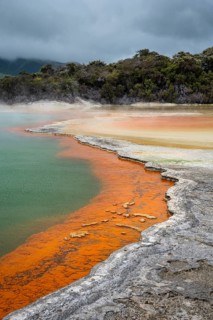 The champagne pool in the Waiotapu geothermal area (Wai-O-Tapu) . orange and yellow. Waiotapu,