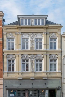 Decorative façade of the upper floors of a residential building, built in 1884, Hanseatic City of