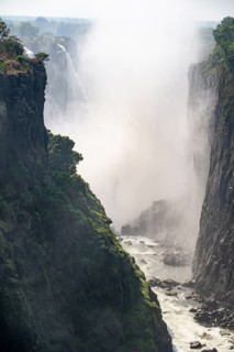 Water plunges into the depths, Victoria Falls with gorge, Zambezi, Zimbabwe