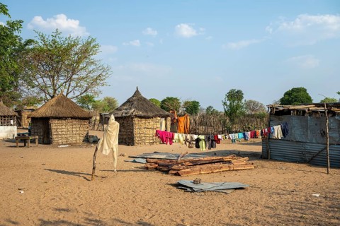 Typical village with mud huts, locals, Caprivi strip, Namibia