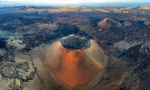 Caldera Colorada volcano, picturesque volcanic landscape with volcanic craters and lava fields in