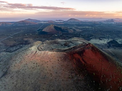 Caldera Colorada volcano, picturesque volcanic landscape with volcanic crater at sunrise, Parque