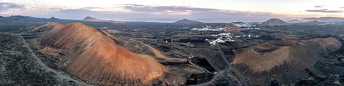 Picturesque volcanic landscape with volcanic craters Montaña de la Tabaiba and Montaña Corujo at