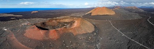 Montaña Quemada and Montaña Pedro Perico volcanoes, volcanic landscape with craters and lava