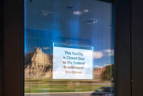 Badlands National Park, South Dakota - Badlands rock formations are mirrored in the door of the
