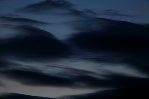 Dark clouds sweep across the sky at dusk, Peenetal nature park Park, Mecklenburg-Western Pomerania,
