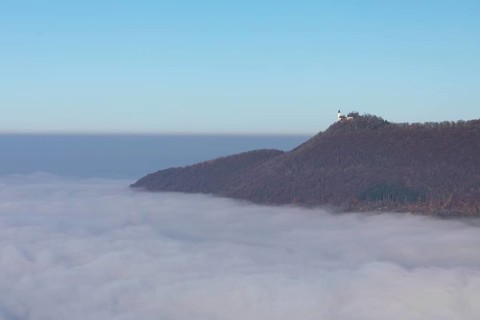 Teck Castle in the magical sea of fog in autumn Swabian Jura Germany