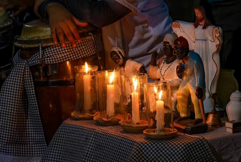 Altar with saints and Umbanda entities in the streets of Belo Horizonte, Minas Gerais, lit with