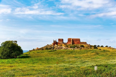 Ruins of Hammershus Fortress, medieval castle ruins on a cliff, tourist attraction, Baltic Sea on