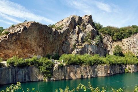 Impressive rock formations, opal lake in the granite quarry, Moselleøkken Stenbrudsmuseum, museum