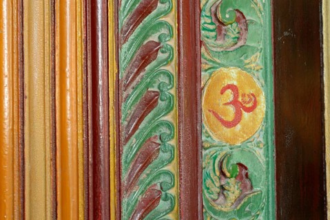 Painted wood carving, Om sign, Kalari Kovilakom, Ayurveda Palace of the Cgh-Earth Hotel Group,