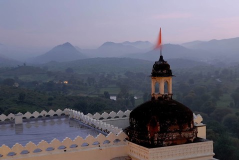 Hilly landscape of Aravalli Mountains in soft twilight, monsoon atmosphere, Devigarh Palace Hotel,