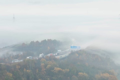 Aichelberg Alb climb of the A8 in thick fog on an autumn morning. Lkr. Göppingen,