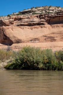 Loma, Colorado - Letters carved into the rock above the Colorado River mark the boundary between