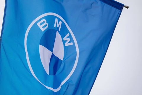 Flag with BMW logo on a car dealership