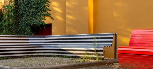 Wooden seating area at Kultkino Babylon on Rosa Luxemburg Platz, arthouse cinema opened in 1929,