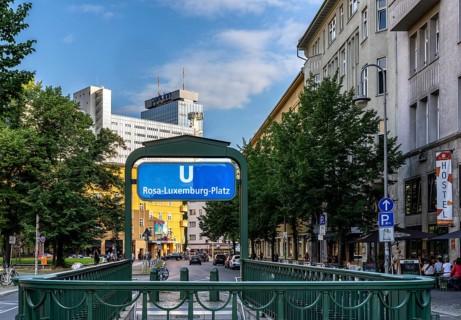 Rosa Luxemburg Platz subway exit with the Park Inn at Alexanderplatz in the background, Berlin,