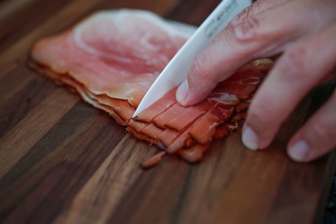 Southern German cuisine, Black Forest ham, smoked, meat, cutting, kitchen knife, wooden board,