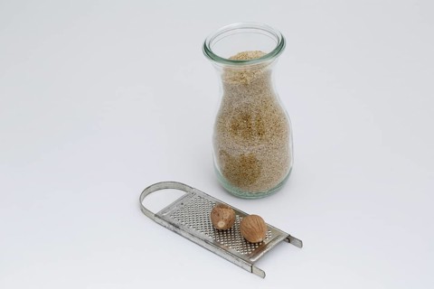 Cutters, nutmeg, spices, grater, ground green core, carafe, studio, food photography, Germany