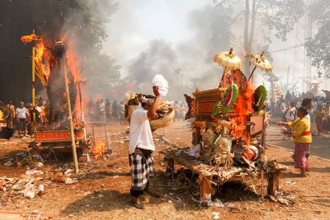 The coffins are incinerated during a corpse cremation (Ngaben) Gianyar, Bali, Indonesia