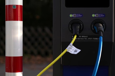 Detailed view, parking lot with gas pump, EnBW charging station for electric cars, charging