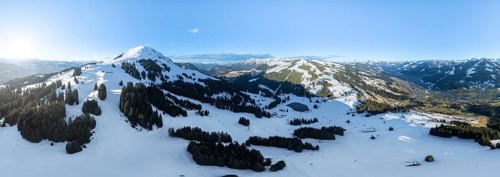Wonderful winter landscape with Hohe Salve, blue sky and snow, mountains and mountain valley,