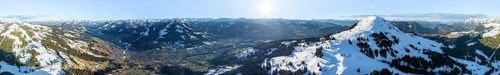 Alpine panorama, fantastic winter landscape with Hohe Salve, blue sky and snow, mountains and