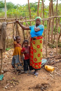 Villagers in a traditional village, mud huts, Sadaani, Tanzania