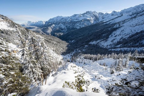 View over snow-covered side valley towards Reintal, snowy mountain landscape, ascent to