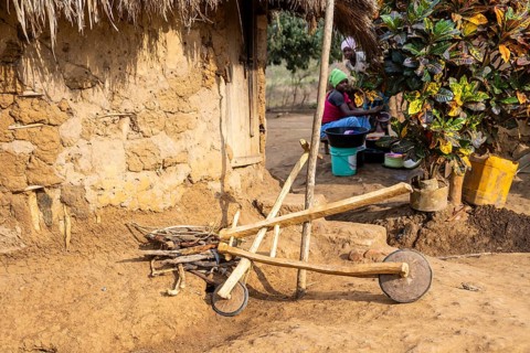Self-built wooden balance bike, in a Sadaani village, Tanga, Tanzania