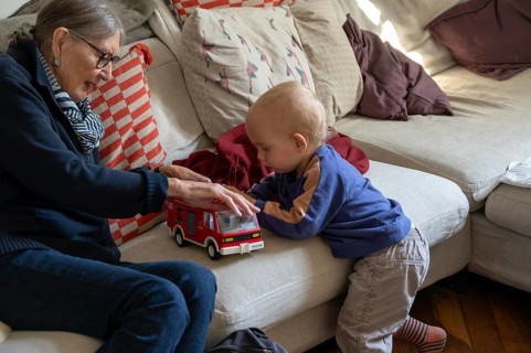 Great-grandmother playing with her great-grandson, two years old, Othenstorf, Mecklenburg-Western