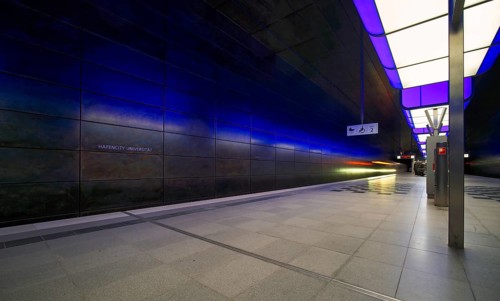 HafenCity University subway station, illuminated in color, blue, underground train, movement