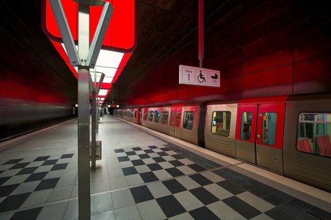 HafenCity University underground station, illuminated in color, green, underground train, U4,