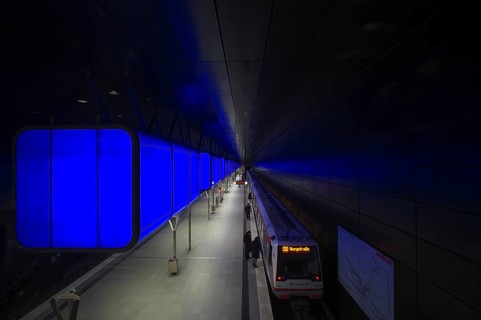 HafenCity University subway station, illuminated in color, blue, underground train, movement
