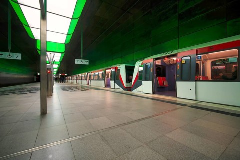 HafenCity University underground station, illuminated in color, green, underground train, U4,
