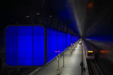 HafenCity University subway station, illuminated in color, blue, underground train, movement